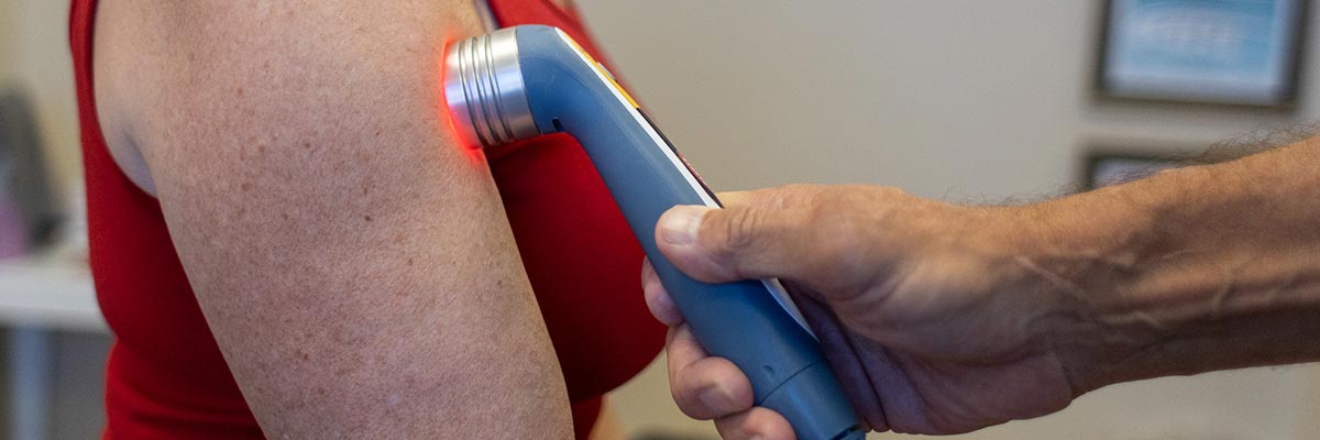 A photo of a patient receiving Cold Laser therapy.