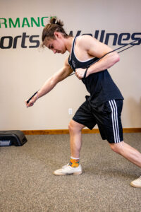 Chest Press Lunge Stance demonstrated by a young male